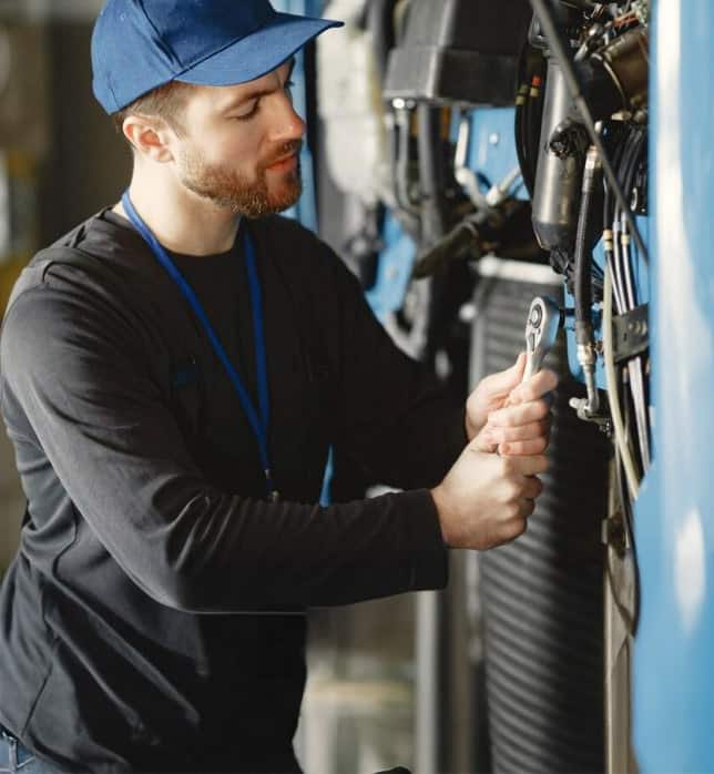 Generator tech performing maintenance